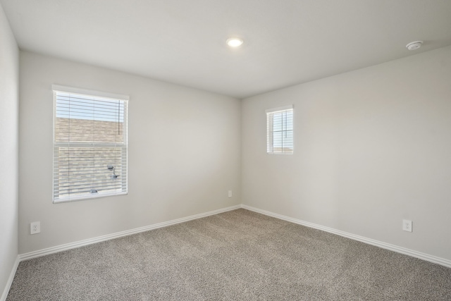 511 Willet Dr, Mckinney, TX 75069 - unfurnished room with baseboards, carpet flooring, a smoke detector, and recessed lighting