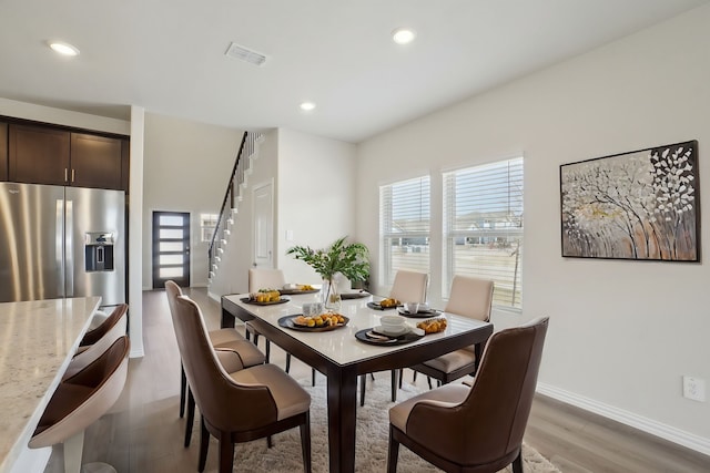 511 Willet Dr, Mckinney, TX 75069 - dining room featuring light wood-style floors, baseboards, stairway, and recessed lighting
