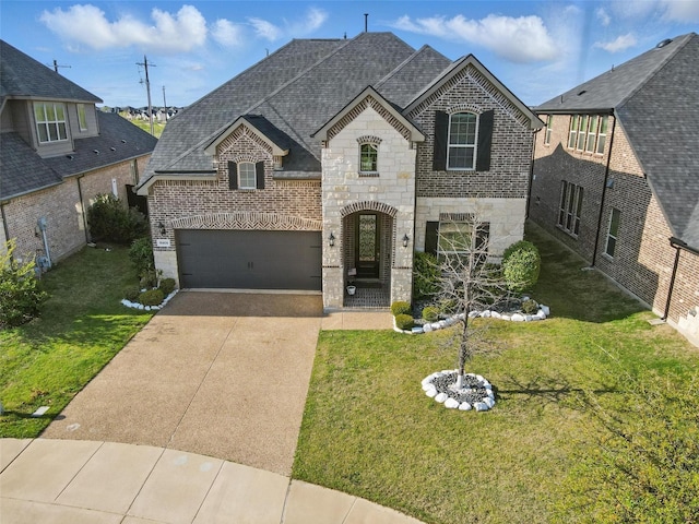 15805 Gladewater Ter, Prosper, TX 75078 - french provincial home featuring brick siding, stone siding, concrete driveway, a front yard, and roof with shingles