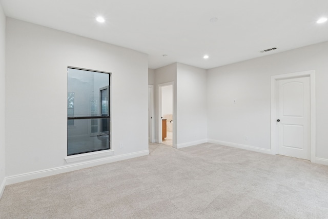 3607 Bryan St, Dallas, TX 75204 - spare room with light carpet, recessed lighting, and baseboards