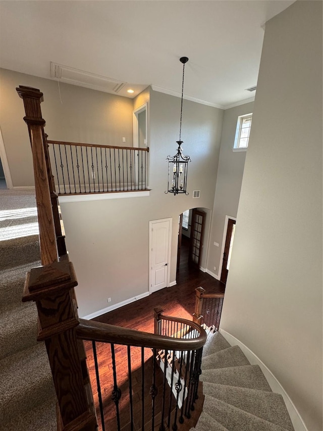 2802 Castlereach St, Trophy Club, TX 76262 - staircase with baseboards, ornamental molding, wood finished floors, recessed lighting, and a chandelier