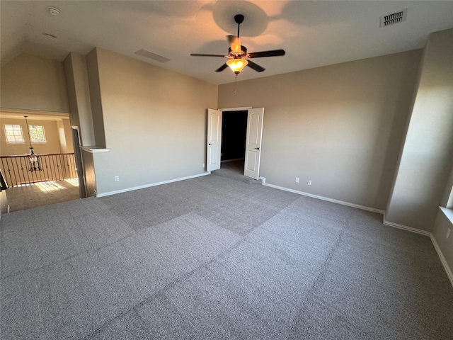2802 Castlereach St, Trophy Club, TX 76262 - carpeted empty room featuring a ceiling fan, baseboards, lofted ceiling, and a smoke detector