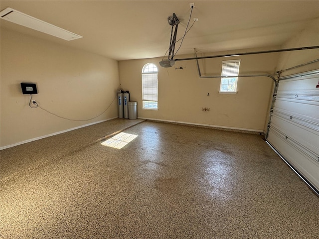 2802 Castlereach St, Trophy Club, TX 76262 - garage featuring baseboards and water heater