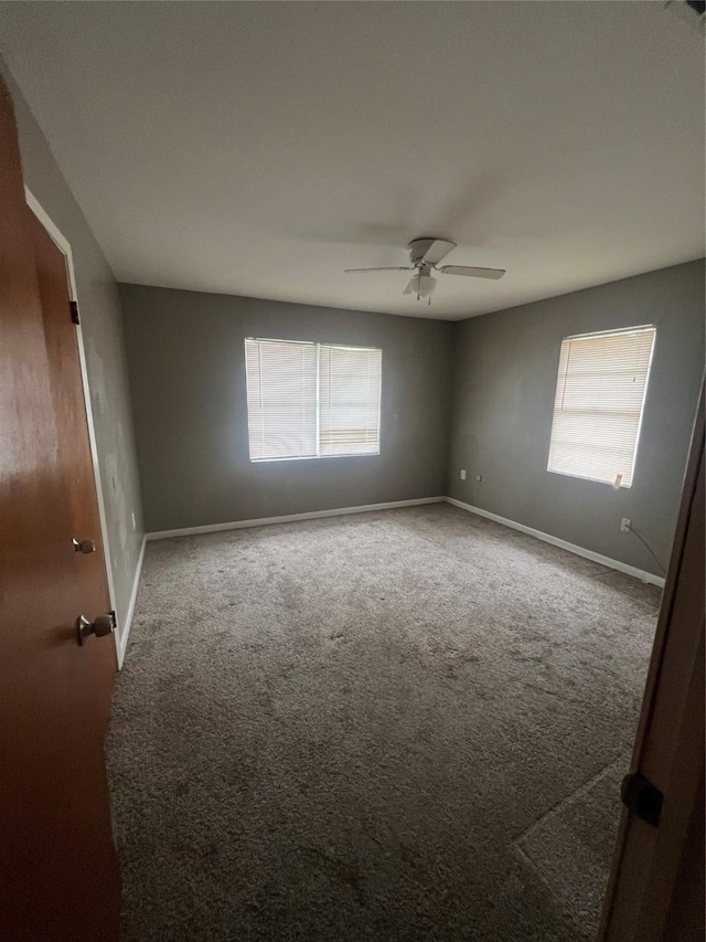 101 Oakland Dr, Lacy Lakeview, TX 76705 - spare room with carpet floors, baseboards, and a ceiling fan