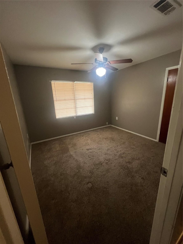 101 Oakland Dr, Lacy Lakeview, TX 76705 - carpeted spare room featuring a ceiling fan and baseboards