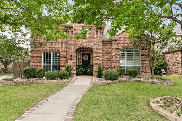 5213 Evening Sun Dr, Frisco, TX 75034 - view of front of home featuring brick siding and a front yard