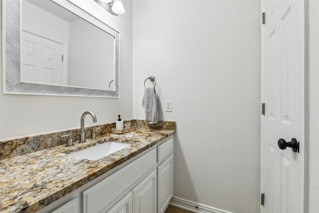 5213 Evening Sun Dr, Frisco, TX 75034 - bathroom featuring vanity and baseboards