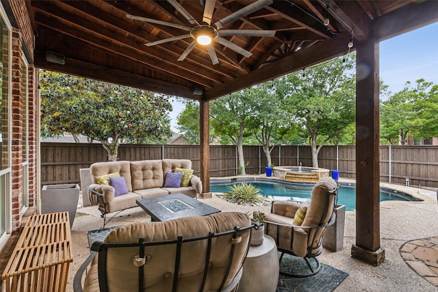 5213 Evening Sun Dr, Frisco, TX 75034 - fenced backyard with an outdoor hangout area, ceiling fan, an in-ground hot tub, and a patio