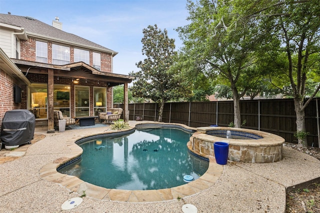 5213 Evening Sun Dr, Frisco, TX 75034 - view of pool featuring grilling area, a patio, a fenced backyard, and a pool with connected hot tub
