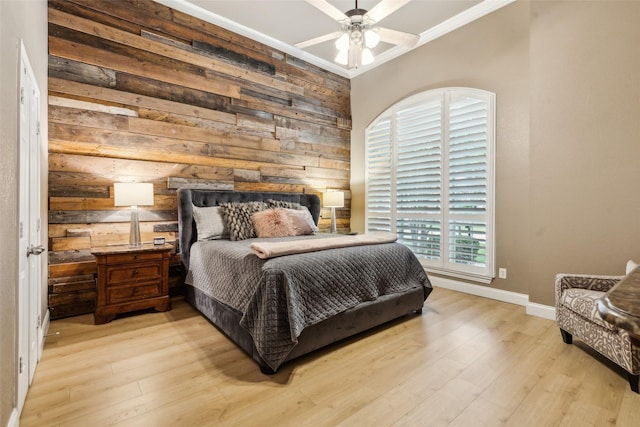 5213 Evening Sun Dr, Frisco, TX 75034 - bedroom featuring wood walls, wood finished floors, ornamental molding, baseboards, and ceiling fan