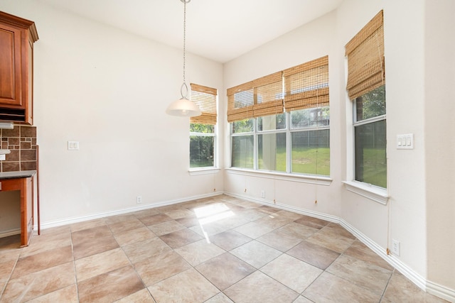 549 Verbena Ln, Frisco, TX 75036 - unfurnished dining area featuring baseboards
