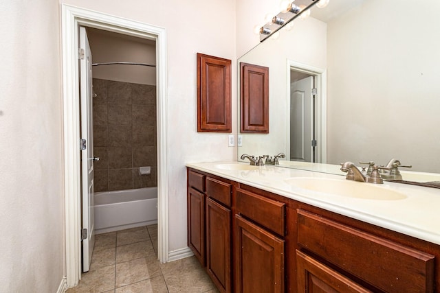 549 Verbena Ln, Frisco, TX 75036 - bathroom featuring tile patterned flooring, double vanity, bathing tub / shower combination, and baseboards