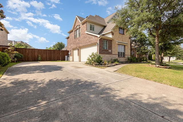 549 Verbena Ln, Frisco, TX 75036 - traditional-style home featuring brick siding, an attached garage, driveway, a shingled roof, and stone siding
