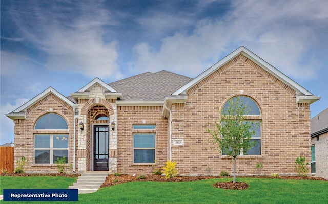 6716 Rosby Ave, Fort Worth, TX 76123 - view of front of house featuring brick siding, a front lawn, and roof with shingles