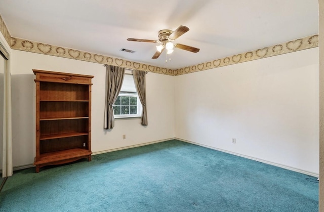1100 County Road 12200, Paris, TX 75462 - carpeted empty room with a ceiling fan and baseboards