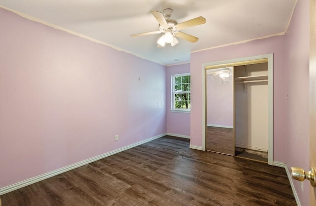 1100 County Road 12200, Paris, TX 75462 - unfurnished bedroom featuring dark wood-style flooring, crown molding, a closet, baseboards, and ceiling fan