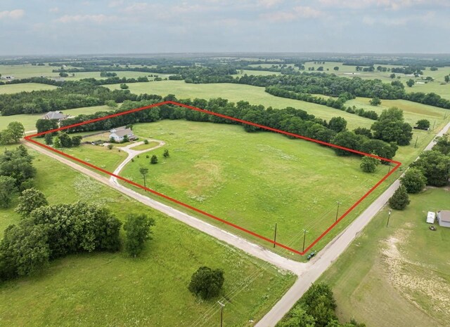 1100 County Road 12200, Paris, TX 75462 - aerial view of sparsely populated area featuring property parcel outlined and a pastoral area