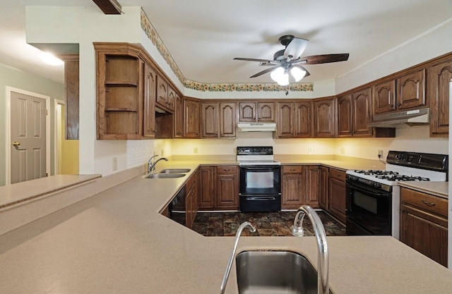 1100 County Road 12200, Paris, TX 75462 - kitchen with gas stove, range with electric stovetop, under cabinet range hood, and a sink