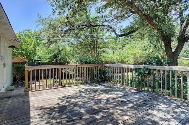 4809 Ira St, Haltom City, TX 76117 - wooden terrace with a fenced backyard