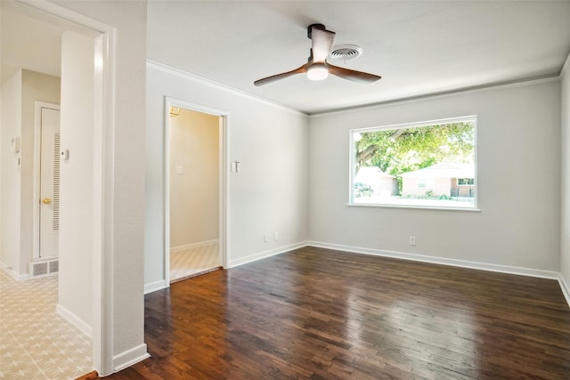 4809 Ira St, Haltom City, TX 76117 - unfurnished room with crown molding, a ceiling fan, dark wood-style flooring, and baseboards