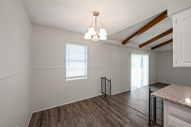 230 NE Craig St, Burleson, TX 76028 - unfurnished dining area with plenty of natural light, a chandelier, a textured ceiling, and dark wood-style floors