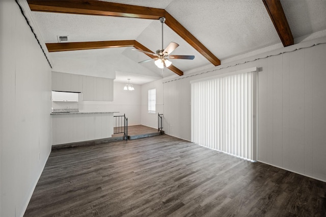 230 NE Craig St, Burleson, TX 76028 - unfurnished living room featuring ceiling fan, dark wood-type flooring, a chandelier, and a textured ceiling
