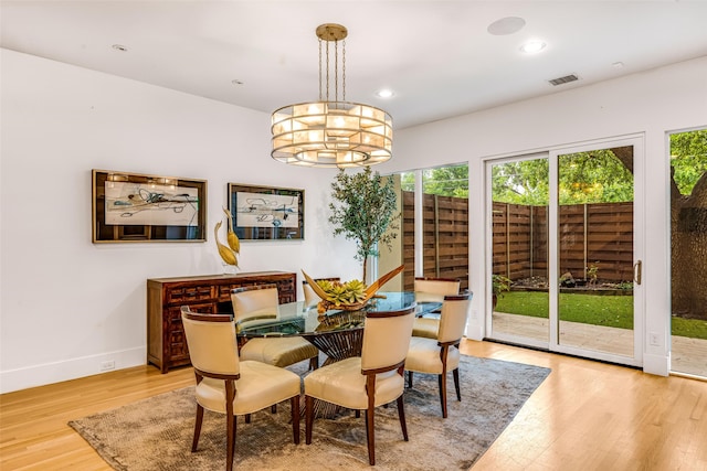 5624 Melshire Dr, Dallas, TX 75230 - dining space with wood finished floors, plenty of natural light, baseboards, recessed lighting, and a chandelier