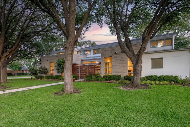 5624 Melshire Dr, Dallas, TX 75230 - contemporary home featuring a yard and stucco siding