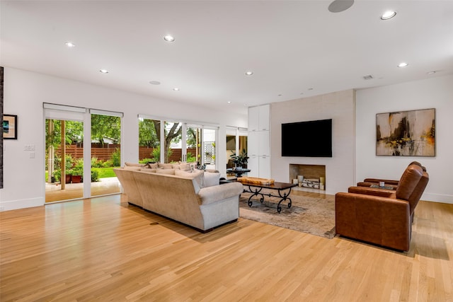5624 Melshire Dr, Dallas, TX 75230 - living room with recessed lighting, light wood finished floors, and baseboards
