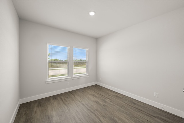 6728 Rockshire, Fort Worth, TX 76123 - empty room with dark wood-type flooring and recessed lighting