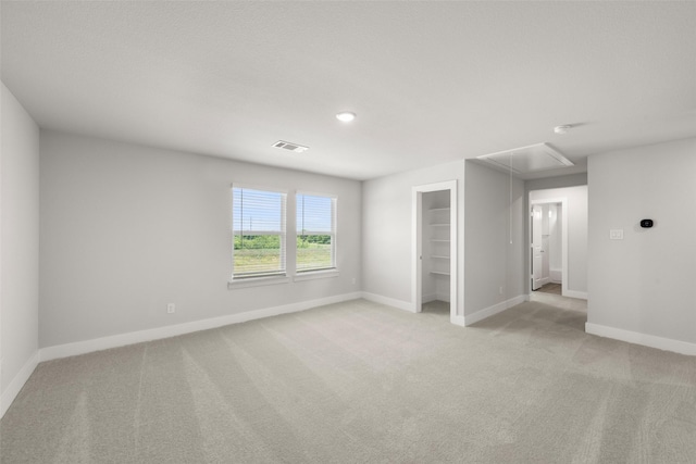 6728 Rockshire, Fort Worth, TX 76123 - unfurnished room with attic access and light colored carpet