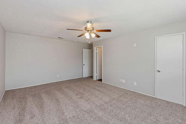 2031 Kings Rd, Carrollton, TX 75007 - carpeted spare room with a ceiling fan