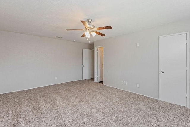 2031 Kings Rd, Carrollton, TX 75007 - carpeted empty room featuring a ceiling fan