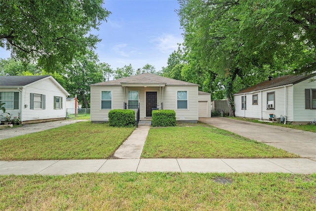1625 Walnut St, Grand Prairie, TX 75050 - view of front of property featuring a garage and driveway