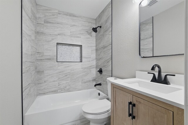 1625 Walnut St, Grand Prairie, TX 75050 - full bath featuring toilet, tub / shower combination, vanity, and a textured wall