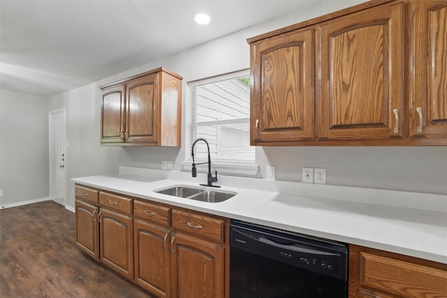 1625 Walnut St, Grand Prairie, TX 75050 - kitchen with black dishwasher, a sink, light countertops, brown cabinets, and dark wood-type flooring