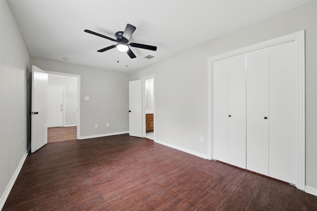 1625 Walnut St, Grand Prairie, TX 75050 - unfurnished bedroom featuring dark wood-style floors and baseboards