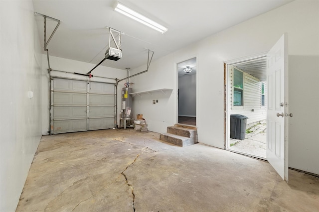 1625 Walnut St, Grand Prairie, TX 75050 - garage featuring a garage door opener