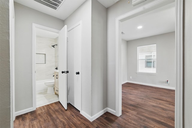 1625 Walnut St, Grand Prairie, TX 75050 - hall with dark wood finished floors and baseboards