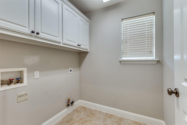 225 Tipperary Dr, Keller, TX 76248 - washroom featuring cabinet space, baseboards, washer hookup, hookup for an electric dryer, and hookup for a gas dryer
