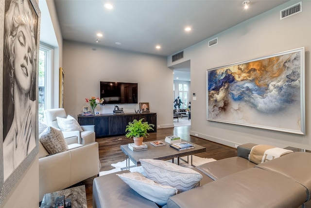 4678 Christopher Pl, Dallas, TX 75204 - living area featuring healthy amount of natural light, wood finished floors, recessed lighting, and baseboards