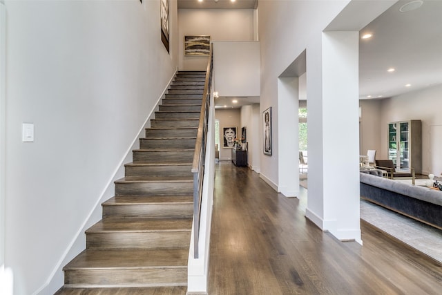 4678 Christopher Pl, Dallas, TX 75204 - stairs with wood finished floors, baseboards, recessed lighting, and a high ceiling