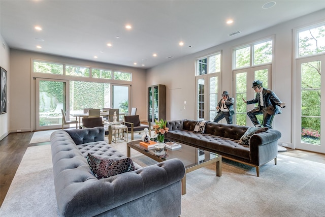 4678 Christopher Pl, Dallas, TX 75204 - living area featuring plenty of natural light, recessed lighting, wood finished floors, and baseboards