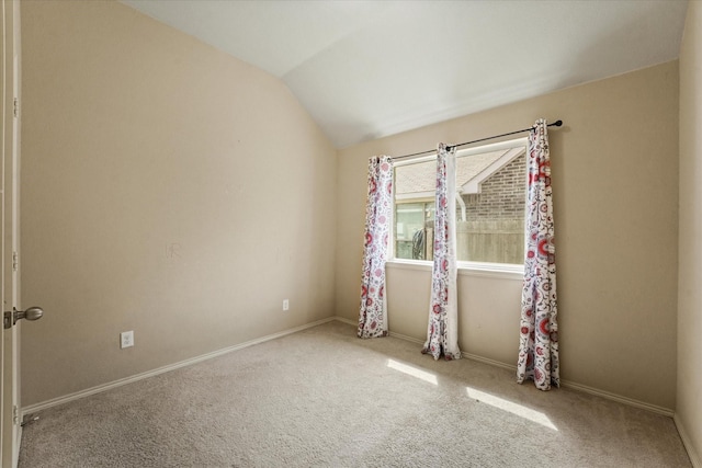 131 Wandering Dr, Forney, TX 75126 - carpeted empty room with vaulted ceiling and baseboards