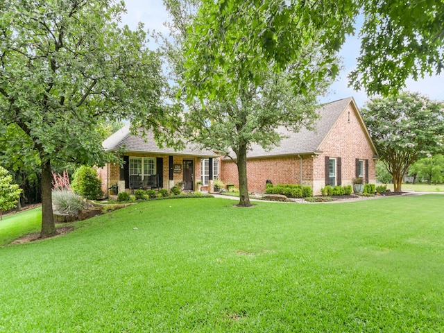 1951 Ravenwood Dr, Keller, TX 76262 - view of front of home featuring brick siding, a front lawn, and a shingled roof