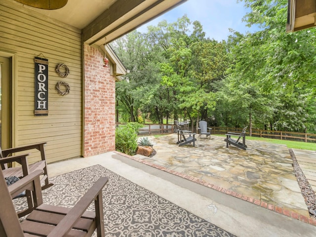 1951 Ravenwood Dr, Keller, TX 76262 - view of patio with an outdoor fire pit and view of scattered trees