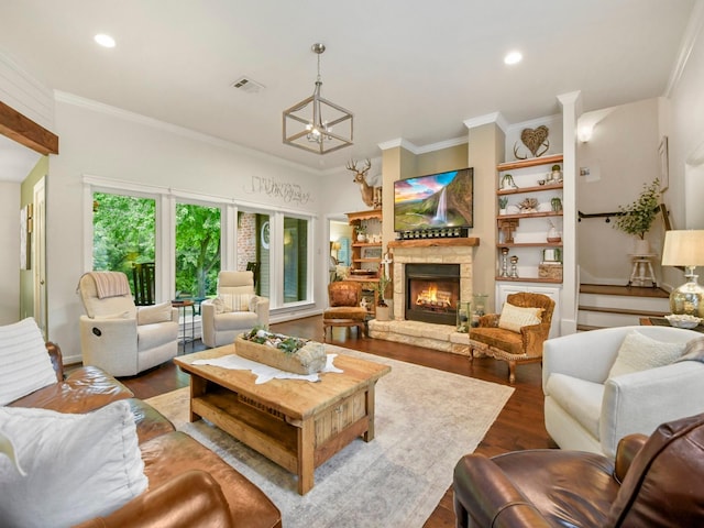 1951 Ravenwood Dr, Keller, TX 76262 - living room featuring dark wood finished floors, recessed lighting, a stone fireplace, ornamental molding, and a chandelier