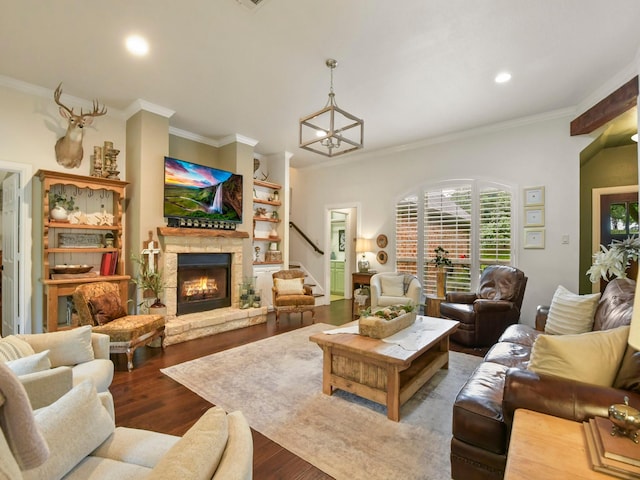 1951 Ravenwood Dr, Keller, TX 76262 - living area featuring ornamental molding, wood finished floors, a fireplace, stairs, and recessed lighting