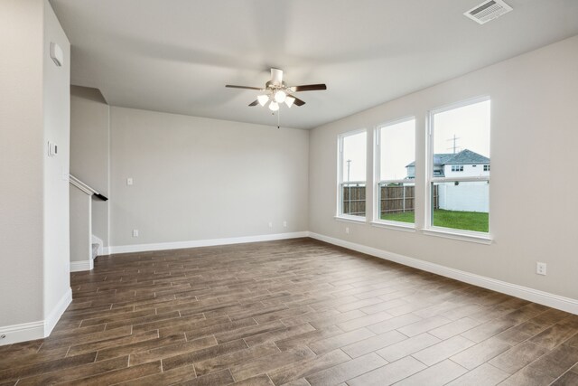 904 Santa Lucia Dr, Anna, TX 75409 - spare room featuring ceiling fan, dark wood-type flooring, and baseboards