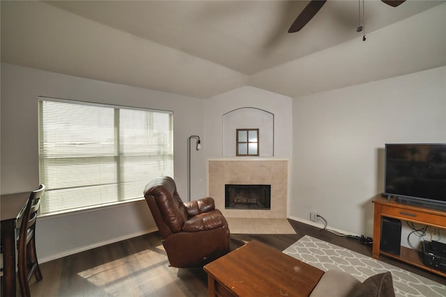 4009 Shiraz Dr, Denton, TX 76226 - living room with ceiling fan, wood finished floors, a tile fireplace, and baseboards